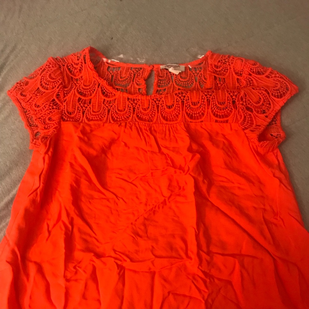 Bright orange shirt